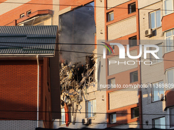 An apartment block is being pictured after it was hit by a Russian missile in Dnipro, Ukraine, on June 28, 2024. Russian troops are attackin...