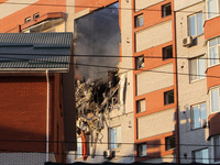 An apartment block is being pictured after it was hit by a Russian missile in Dnipro, Ukraine, on June 28, 2024. Russian troops are attackin...