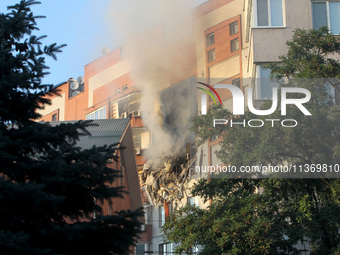 An apartment block is being pictured after it was hit by a Russian missile in Dnipro, Ukraine, on June 28, 2024. Russian troops are attackin...