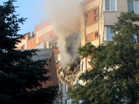 An apartment block is being pictured after it was hit by a Russian missile in Dnipro, Ukraine, on June 28, 2024. Russian troops are attackin...