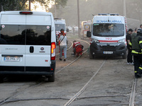 Ambulances are being pictured during a search and rescue effort at an apartment block hit by a Russian missile in Dnipro, Ukraine, on June 2...