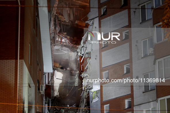 An apartment block is being pictured after it was hit by a Russian missile in Dnipro, Ukraine, on June 28, 2024. Russian troops are attackin...