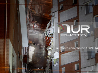 An apartment block is being pictured after it was hit by a Russian missile in Dnipro, Ukraine, on June 28, 2024. Russian troops are attackin...