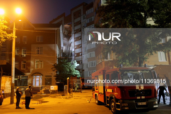 A fire engine is parking outside an apartment block hit by a Russian missile in Dnipro, Ukraine, on June 28, 2024. Russian troops are attack...