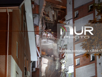 An apartment block is being pictured after it was hit by a Russian missile in Dnipro, Ukraine, on June 28, 2024. Russian troops are attackin...