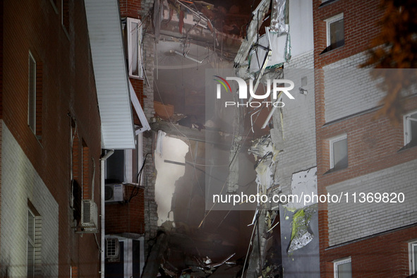 An apartment block is being pictured after it was hit by a Russian missile in Dnipro, Ukraine, on June 28, 2024. Russian troops are attackin...