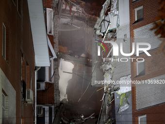 An apartment block is being pictured after it was hit by a Russian missile in Dnipro, Ukraine, on June 28, 2024. Russian troops are attackin...