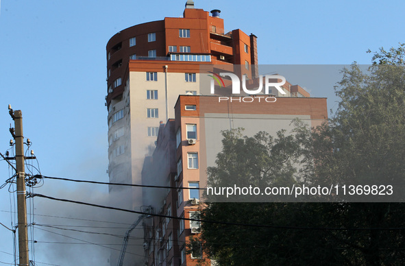 An apartment block is being pictured after it was hit by a Russian missile in Dnipro, Ukraine, on June 28, 2024. Russian troops are attackin...