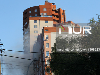 An apartment block is being pictured after it was hit by a Russian missile in Dnipro, Ukraine, on June 28, 2024. Russian troops are attackin...