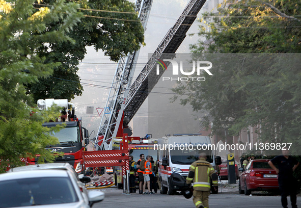 A search and rescue effort is underway at an apartment block hit by a Russian missile in Dnipro, Ukraine, on June 28, 2024. Russian troops a...