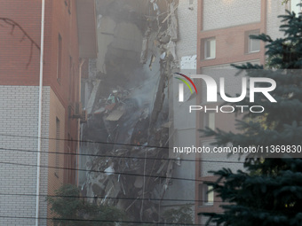 An apartment block is being pictured after it was hit by a Russian missile in Dnipro, Ukraine, on June 28, 2024. Russian troops are attackin...