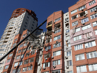 A crane is being used during a search and rescue effort at an apartment block damaged by the June 28 Russian missile attack in Dnipro, Ukrai...