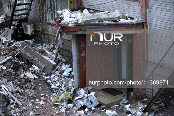 The entrance to an apartment block damaged by the June 28 Russian missile attack is being pictured in Dnipro, Ukraine, on June 29, 2024. Rus...