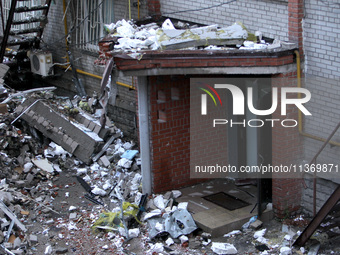 The entrance to an apartment block damaged by the June 28 Russian missile attack is being pictured in Dnipro, Ukraine, on June 29, 2024. Rus...