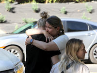 Women affected by the June 28 Russian missile attack on the apartment block are sharing an embrace in Dnipro, Ukraine, on June 29, 2024. Rus...