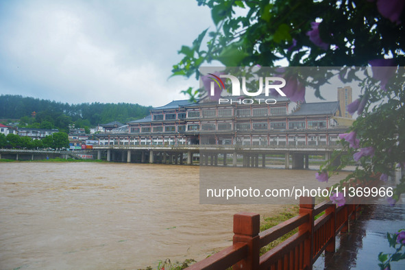 The water level of Yaqian River is rising after heavy rainfall in Anqing, China, on June 29, 2024. 