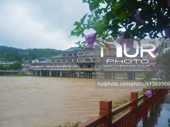 The water level of Yaqian River is rising after heavy rainfall in Anqing, China, on June 29, 2024. (