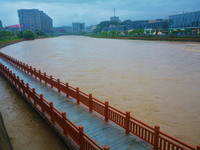 The water level of Yaqian River is rising after heavy rainfall in Anqing, China, on June 29, 2024. (