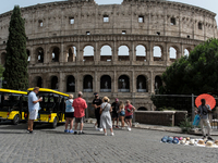 Tourists are visiting the Colosseum area, where temperatures are reaching 36 degrees Celsius in Rome, Italy, on June 29, 2024. (