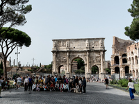 Tourists are visiting the Colosseum area, where temperatures are reaching 36 degrees Celsius in Rome, Italy, on June 29, 2024. (