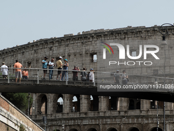 Tourists are visiting the Colosseum area, where temperatures are reaching 36 degrees Celsius in Rome, Italy, on June 29, 2024. (