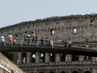 Tourists are visiting the Colosseum area, where temperatures are reaching 36 degrees Celsius in Rome, Italy, on June 29, 2024. (