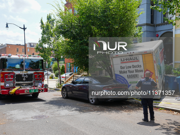 A U-haul truck is driving up the stairs and into a massage parlor in the Adams Morgan neighborhood of Washington D.C. No one is injured. 