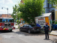 A U-haul truck is driving up the stairs and into a massage parlor in the Adams Morgan neighborhood of Washington D.C. No one is injured. (