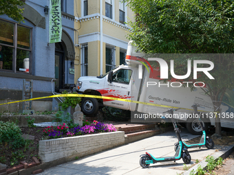 A U-haul truck is driving up the stairs and into a massage parlor in the Adams Morgan neighborhood of Washington D.C. No one is injured. (