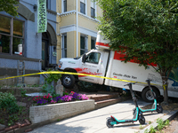 A U-haul truck is driving up the stairs and into a massage parlor in the Adams Morgan neighborhood of Washington D.C. No one is injured. (