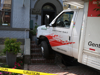 A U-haul truck is driving up the stairs and into a massage parlor in the Adams Morgan neighborhood of Washington D.C. No one is injured. (