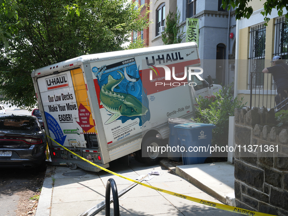 A U-haul truck is driving up the stairs and into a massage parlor in the Adams Morgan neighborhood of Washington D.C. No one is injured. 