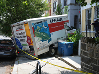 A U-haul truck is driving up the stairs and into a massage parlor in the Adams Morgan neighborhood of Washington D.C. No one is injured. (