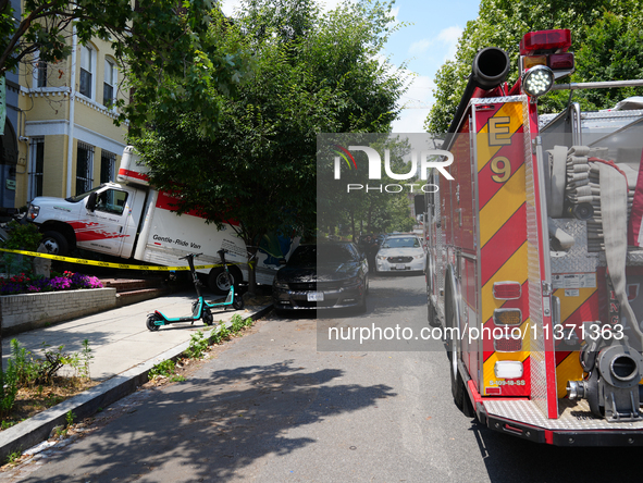 A U-haul truck is driving up the stairs and into a massage parlor in the Adams Morgan neighborhood of Washington D.C. No one is injured. 