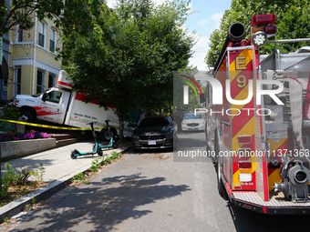 A U-haul truck is driving up the stairs and into a massage parlor in the Adams Morgan neighborhood of Washington D.C. No one is injured. (