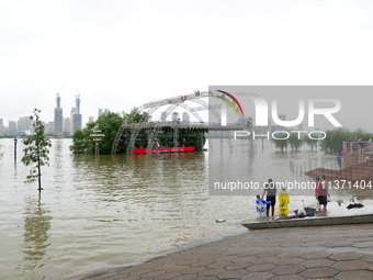 The Hankou Riverbank Park of the Yangtze River is flooding in Wuhan, China, on June 29, 2024. Heavy rain is continuing in Wuhan. (