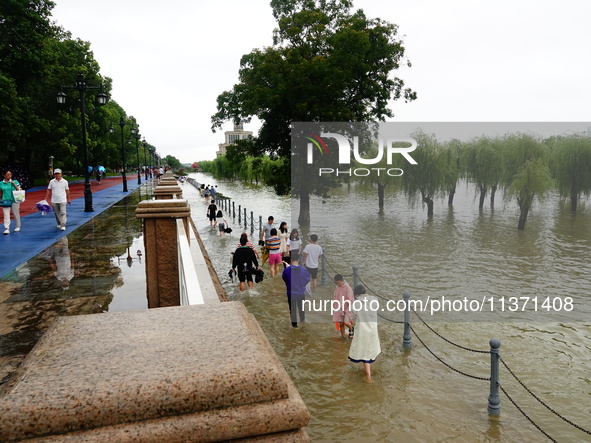 The Hankou Riverbank Park of the Yangtze River is flooding in Wuhan, China, on June 29, 2024. Heavy rain is continuing in Wuhan. 