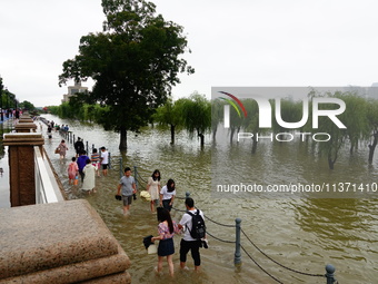 The Hankou Riverbank Park of the Yangtze River is flooding in Wuhan, China, on June 29, 2024. Heavy rain is continuing in Wuhan. (