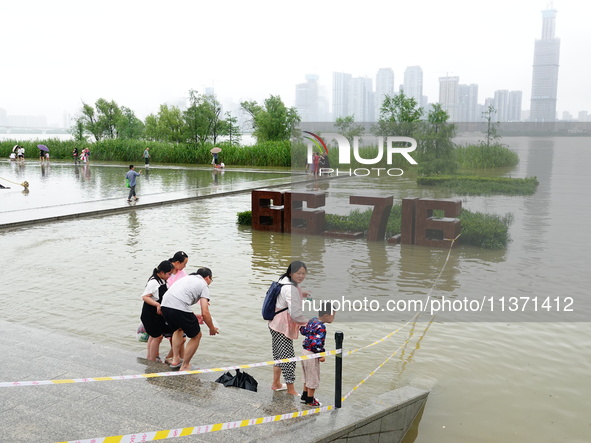 The Hankou Riverbank Park of the Yangtze River is flooding in Wuhan, China, on June 29, 2024. Heavy rain is continuing in Wuhan. 