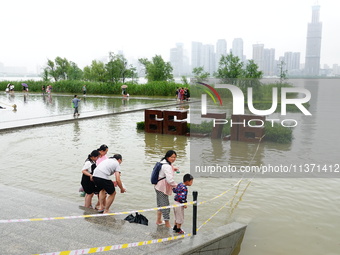 The Hankou Riverbank Park of the Yangtze River is flooding in Wuhan, China, on June 29, 2024. Heavy rain is continuing in Wuhan. (