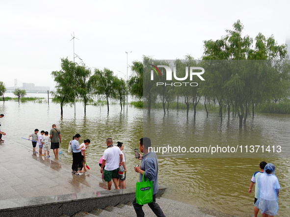 The Hankou Riverbank Park of the Yangtze River is flooding in Wuhan, China, on June 29, 2024. Heavy rain is continuing in Wuhan. 