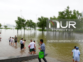 The Hankou Riverbank Park of the Yangtze River is flooding in Wuhan, China, on June 29, 2024. Heavy rain is continuing in Wuhan. (