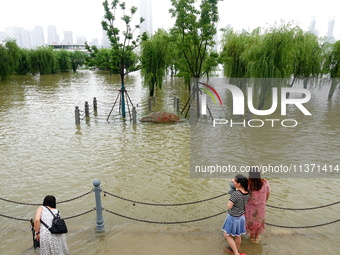 The Hankou Riverbank Park of the Yangtze River is flooding in Wuhan, China, on June 29, 2024. Heavy rain is continuing in Wuhan. (