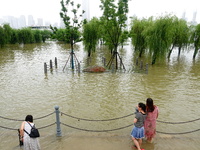 The Hankou Riverbank Park of the Yangtze River is flooding in Wuhan, China, on June 29, 2024. Heavy rain is continuing in Wuhan. (