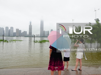 The Hankou Riverbank Park of the Yangtze River is flooding in Wuhan, China, on June 29, 2024. Heavy rain is continuing in Wuhan. (