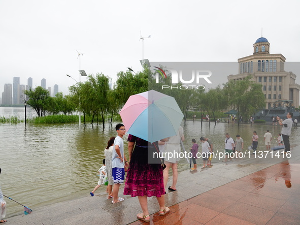 The Hankou Riverbank Park of the Yangtze River is flooding in Wuhan, China, on June 29, 2024. Heavy rain is continuing in Wuhan. 