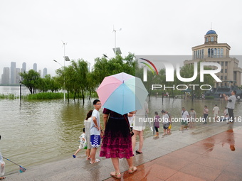 The Hankou Riverbank Park of the Yangtze River is flooding in Wuhan, China, on June 29, 2024. Heavy rain is continuing in Wuhan. (