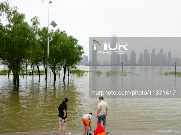 The Hankou Riverbank Park of the Yangtze River is flooding in Wuhan, China, on June 29, 2024. Heavy rain is continuing in Wuhan. 