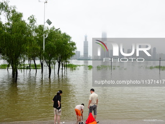 The Hankou Riverbank Park of the Yangtze River is flooding in Wuhan, China, on June 29, 2024. Heavy rain is continuing in Wuhan. (