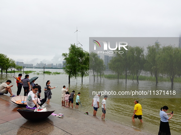 The Hankou Riverbank Park of the Yangtze River is flooding in Wuhan, China, on June 29, 2024. Heavy rain is continuing in Wuhan. 